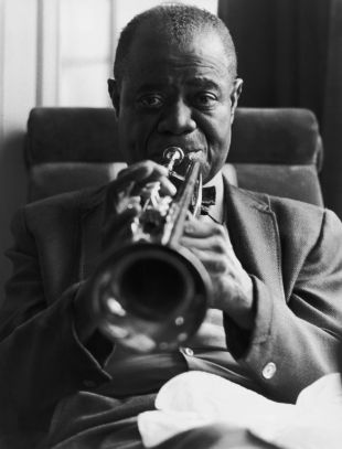 Louis Armstrong, Biography, Movie Highlights and Photos